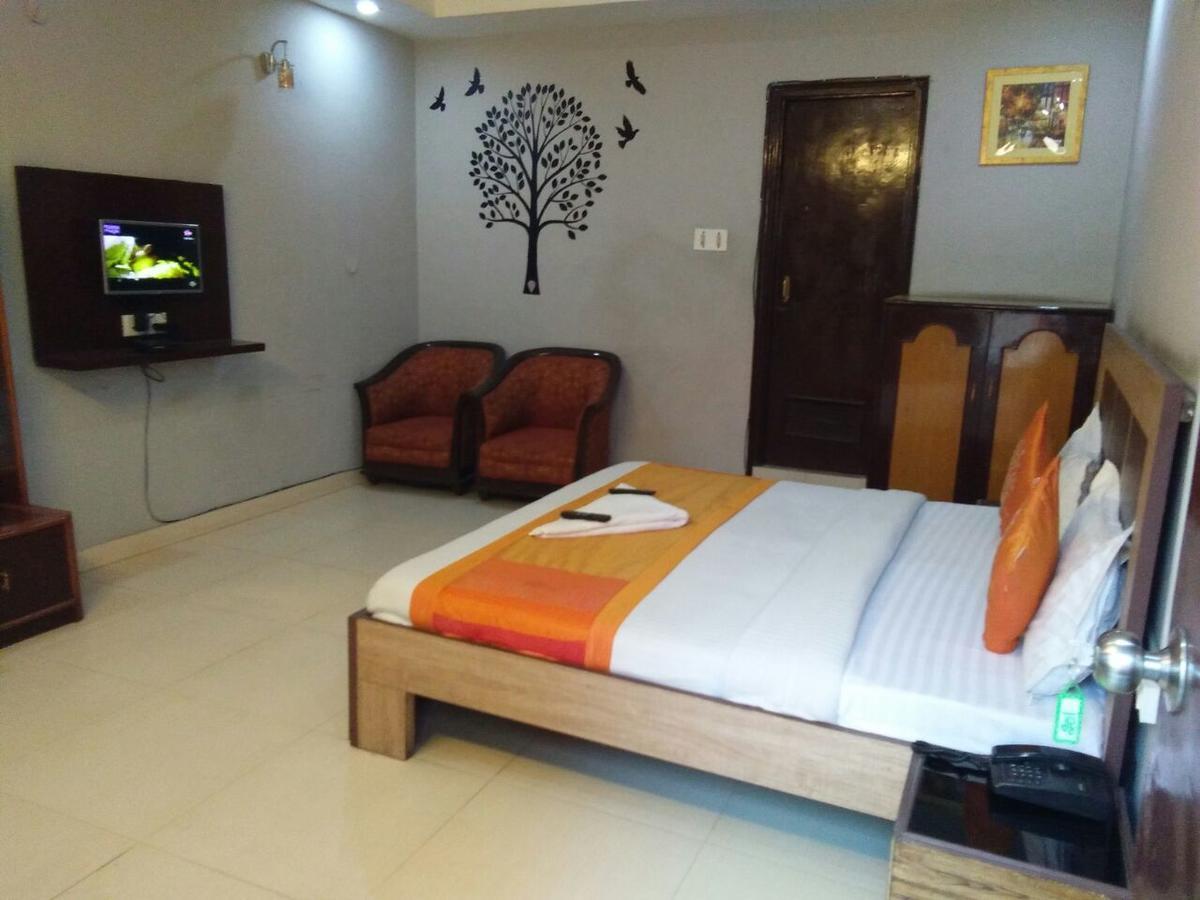 Hotel Samridhi Palace Juhi Bari Extérieur photo